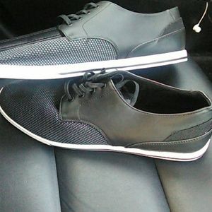 Black Aldo leather and mesh toe shoe